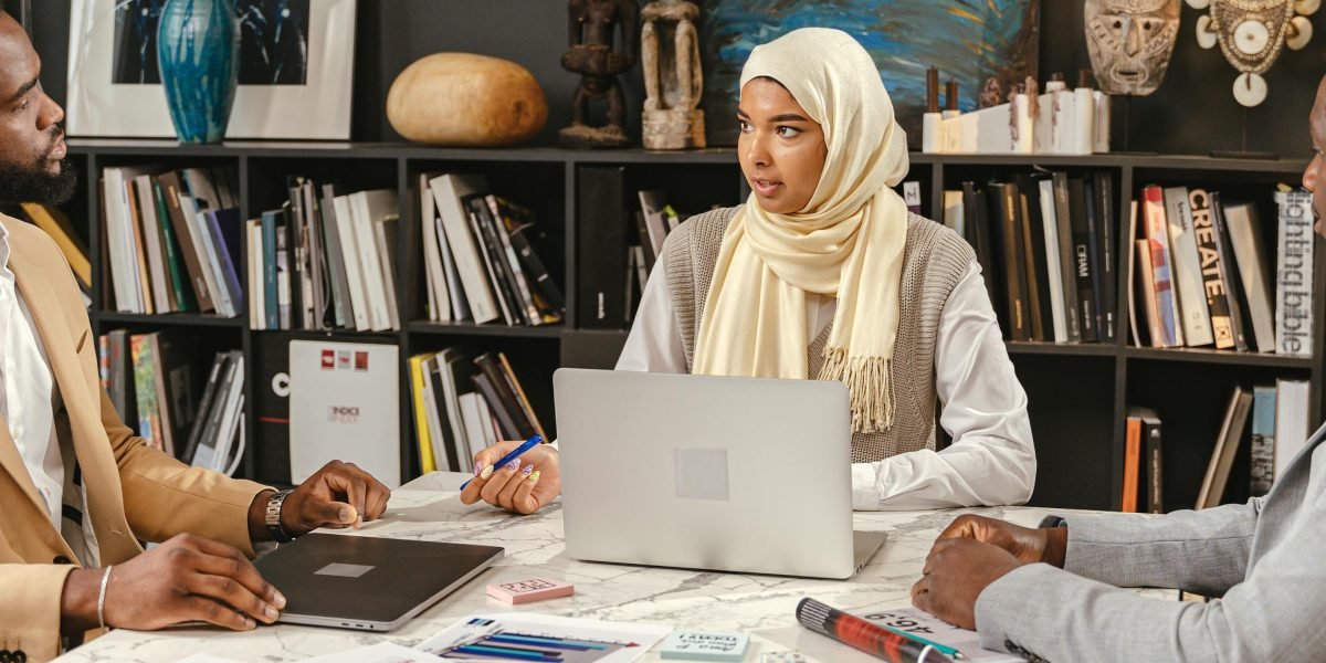 A diverse group of professionals actively collaborating, representing varied perspectives and skills.