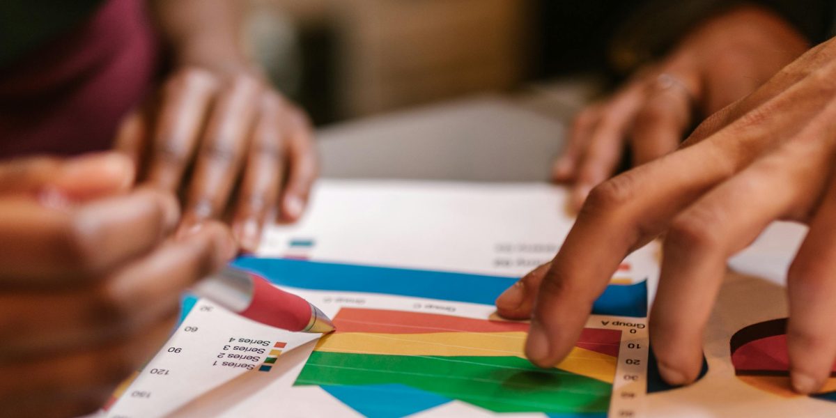 A marketing professional analyzes engagement metrics and conversion rates to determine the effectiveness of humor in content marketing.