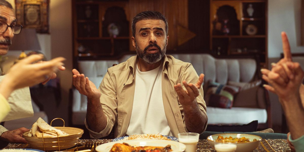 A depiction of a family meal with underlying tension, reflecting the dynamic in 'The Great Santini'.
