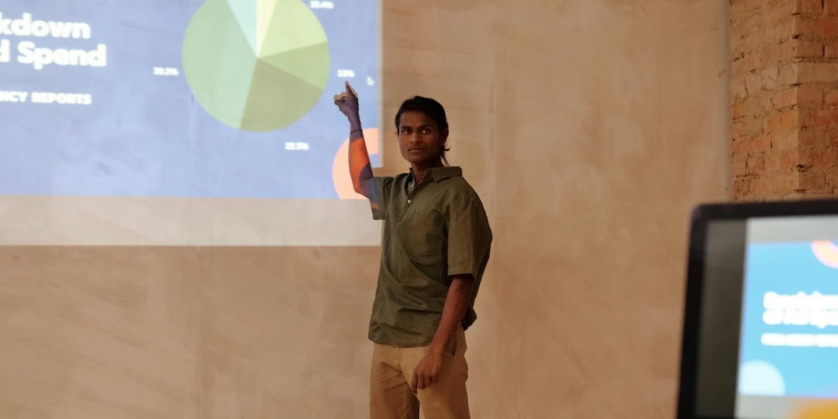A professional presenting a marketing strategy, demonstrating engaging and effective communication.